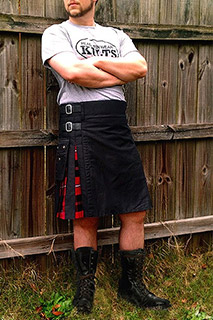 Utility kilt with tartan pleat cutouts